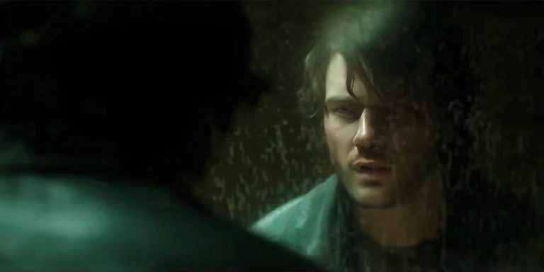 jeremy-irvine-as-james-sunderland-looking-worried-in-a-dirty-mirror-in-return-to-silent-hill-1